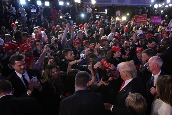 Republican presidential elect Donald Trump meets supporters on November 9, 2016. Trump stunned America and the world Wednesday, riding a wave of populist resentment to defeat Hillary Clinton in the race to become the 45th president of the United States.