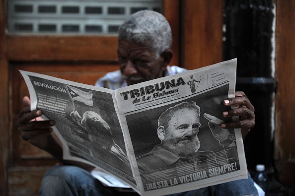 A man reads a newspaper in a street of Havana, on November 27, 2016, two days after Cuban revolutionary leader Fidel Castro died.
Cuban revolutionary icon Fidel Castro died late November 25.