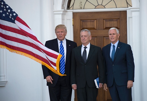 US President-elect Donald Trump poses for a photo with US Marines General (Ret.) James Mattis and Vice President-elect Mike Pence on Nov. 19 at the clubhouse at Trump National Golf Club in Bedminster, New Jersey. 