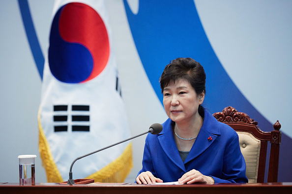 In this handout photo released by the South Korean Presidential Blue House, South Korea's President Park Geun-Hye attends the emergency cabinet meeting Dec. 9 at the presidential office in Seoul, South Korea.  