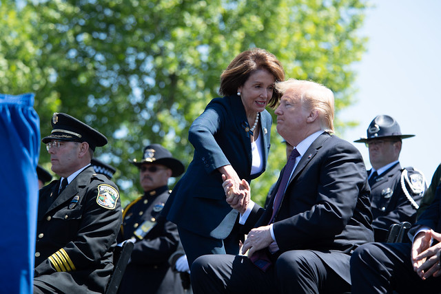 President Trump shakes hands with House Speaker Nancy Pelosi at  the 38th Annual National Peace Officers' Memorial Service at the Capitol. 