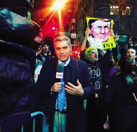 CNN's Jim Acosta reports from outside of Trump Tower on November 9, 2016.  
