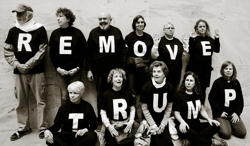 Demonstrators at the U.S. Senate call for the impeachment of President Trump on January 6, 2020. 