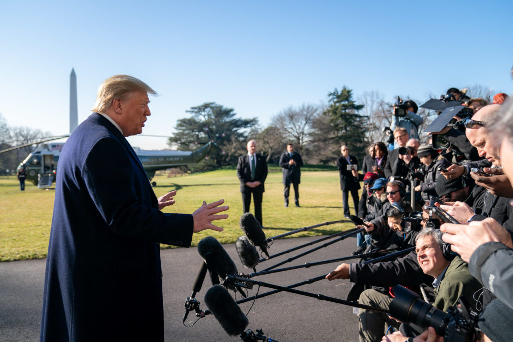 Pres. Donald Trump stops to talk with reporters outside the White House Sunday morning, prior to boarding Marine One to begin his trip to India.  He was asked to comment about Russian interference in the upcoming election and whether he believes the Kremlin is supporting his reelection. 