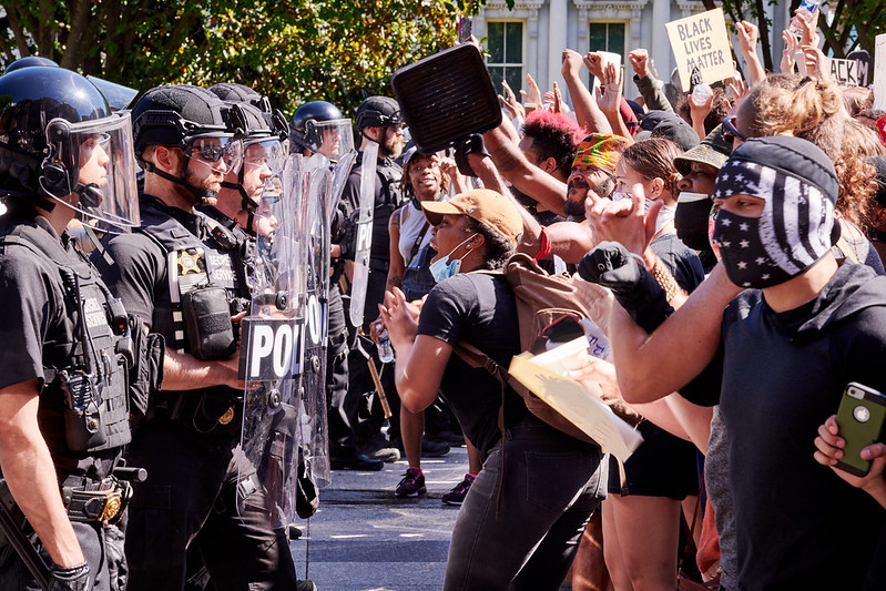 Protestors confront the Secret Service by the White House on May 30, 2020.