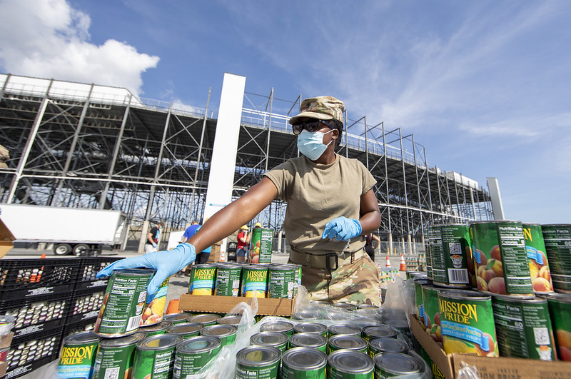 The Delaware Army National Guard runs a canned goods drive-thru food pantry on June 24, 2020.