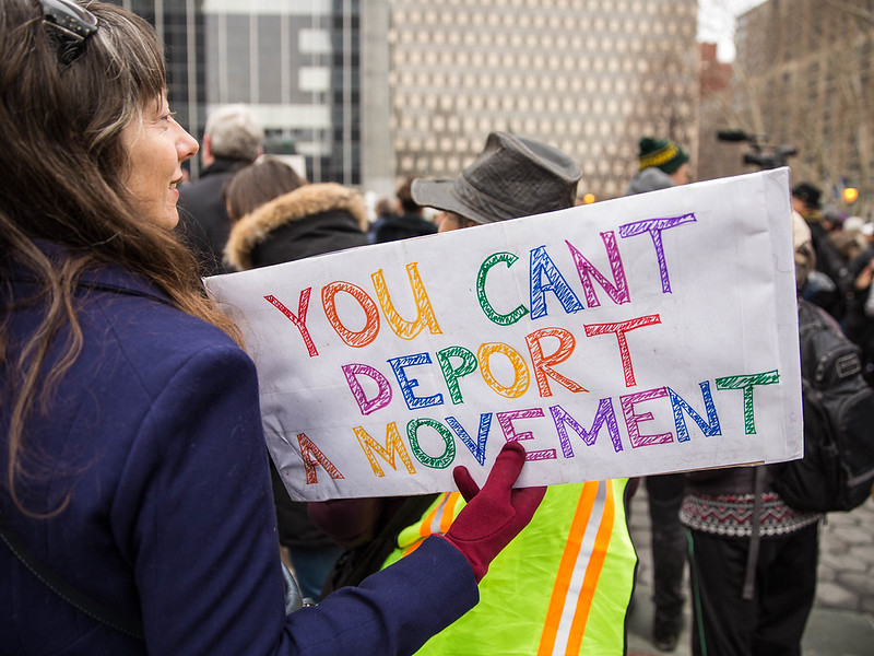 A woman holds a sign at a rally in New York on February 10, 2018. 