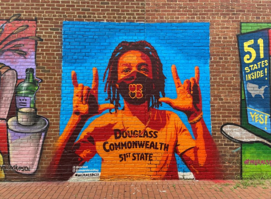A D.C. statehood mural by César Maxit, You Are Loved and BlackLove on the side of the Atlas Performing Arts Center in Washington D.C.
