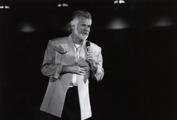 Kenny Rogers performs at a concert in 1991.