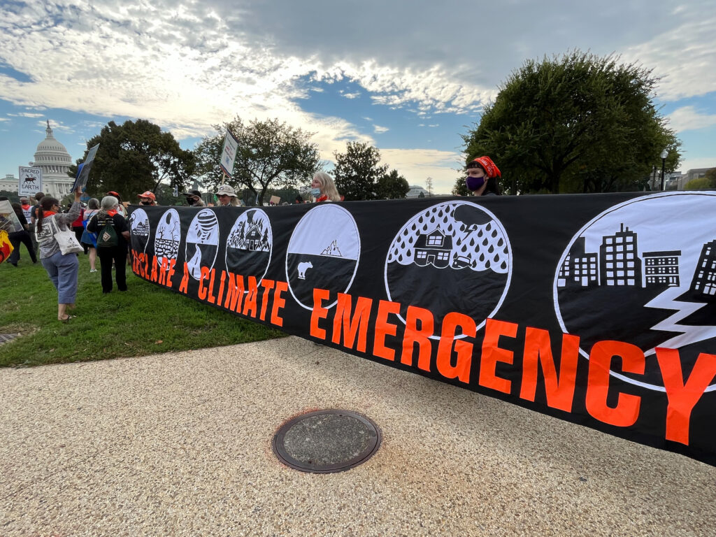 Protesters gather earlier this month near the Capitol building in Washington, DC, to demand action on climate change. 
