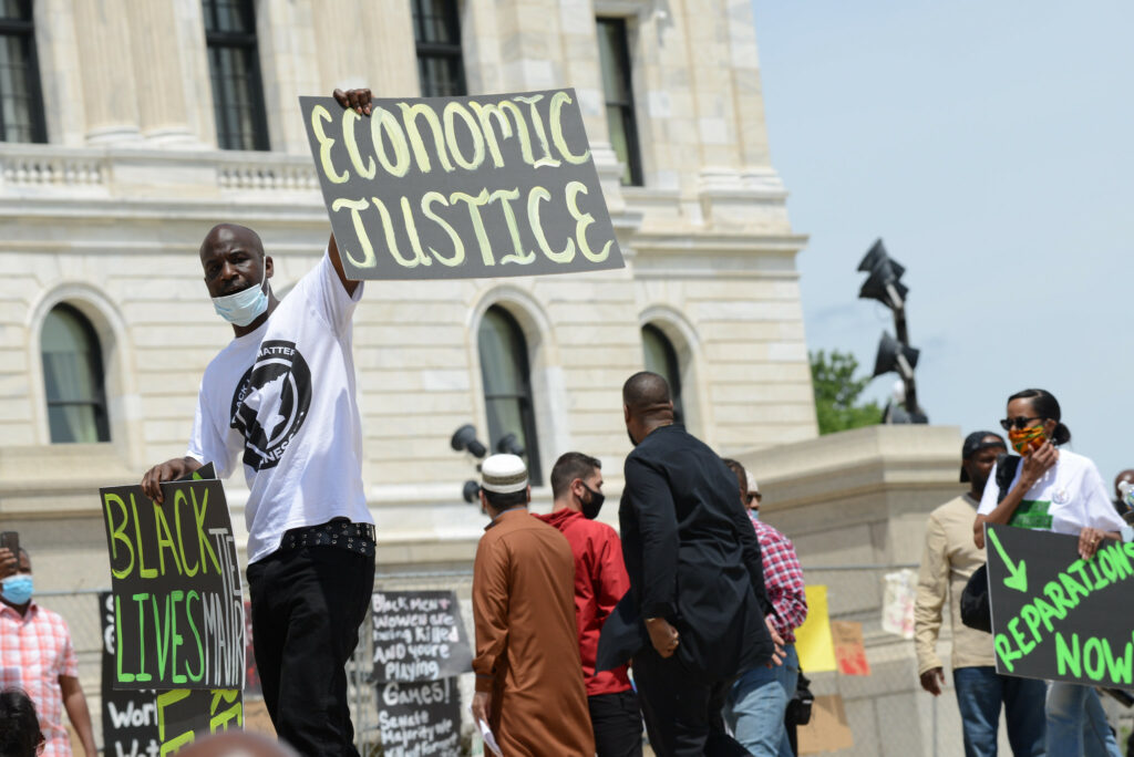 About 300 people gathered outside the Minnesota capitol building to demand reparations from the United States government on June 19, 2020, Juneteenth.