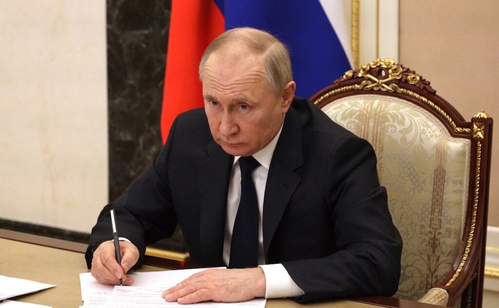 Russian President Vladimir Putin meets with members of the his government via videoconference.