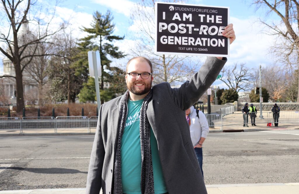 A member of Students for Life holds a sign outside of the Supreme Court at this year's March for Life, the anti-abortion gathering held every January in Washington, D.C.