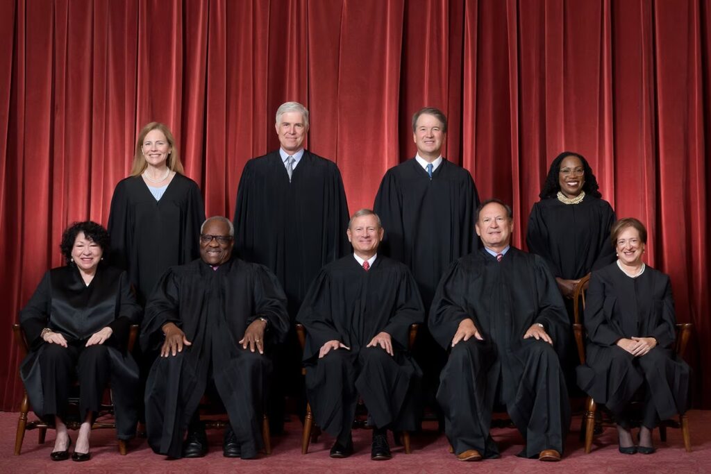 The Supreme Court as composed June 30, 2022 to present.
Front row, left to right: Associate Justice Sonia Sotomayor, Associate Justice Clarence Thomas, Chief Justice John G. Roberts, Jr., Associate Justice Samuel A. Alito, Jr., and Associate Justice Elena Kagan.
Back row, left to right: Associate Justice Amy Coney Barrett, Associate Justice Neil M. Gorsuch, Associate Justice Brett M. Kavanaugh, and Associate Justice Ketanji Brown Jackson.