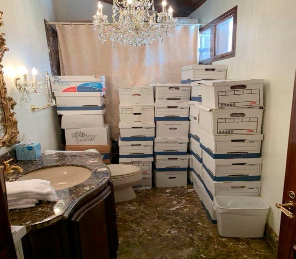 Files sit in a bathroom at Donald Trump's estate, Mar-a-Lago. This photograph was contained in the indictment against the former president related to the handling of classified documents.