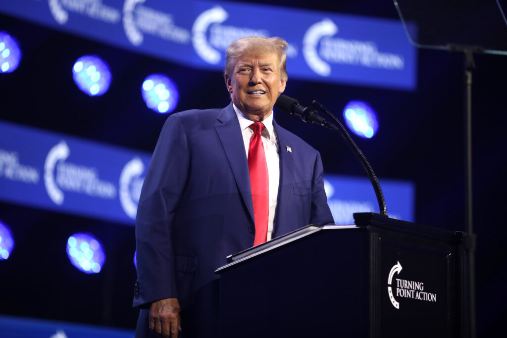 Former President of the United States Donald Trump speaking with attendees at the 2023 Turning Point Action Conference at the Palm Beach County Convention Center in West Palm Beach, Florida.