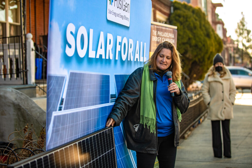 Representatives of the city of Philadelphia display residential rooftop solar panels as part of the Solarize Philly program. Household solar is one of a suite of green technologies experts say U.S. homes must adopt for the country to achieve net-zero emissions. 