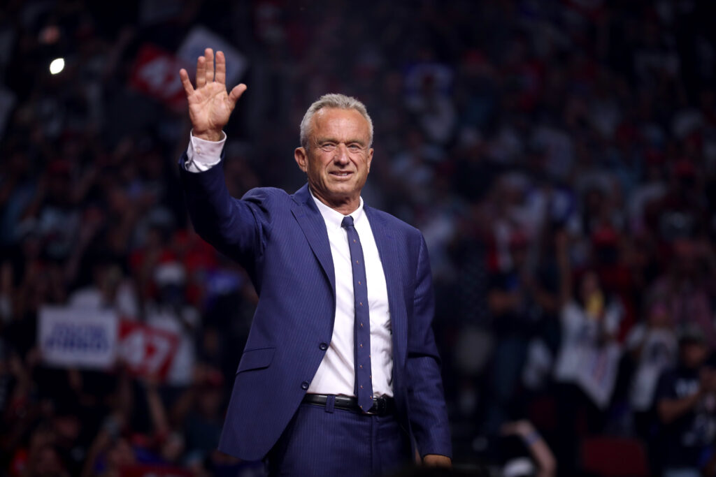 Robert F. Kennedy Jr. speaking with attendees at an Arizona for Trump rally at Desert Diamond Arena in Glendale, Arizona.