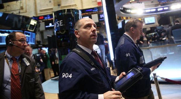 Traders work on the floor of the New York Stock Exchange on January 27, 2014 in New York City. Following a drop of over 300 points on Friday, U.S. markets stabilized in early trading January 27, with the Dow Jones industrial average and the S&P 500 up slightly. 