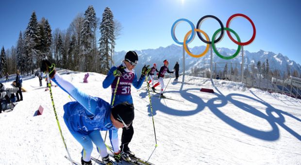 Cross-Country skier Riikka Sarasoja-Lilja of Finland speaks with a coach during training ahead of the Sochi 2014 Winter Olympics at the Laura Cross-Country Ski and Biathlon Center on February 5, 2014 in Sochi, Russia. 