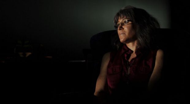 Su Meck poses for a portrait at her family's home on Thursday, May 19, 2011, in Gaithersburg, Md. Meck lost her memory at age of 22 and never recovered it. She graduated with an associate's degree from Montgomery College on Friday, May 20, 2011. 