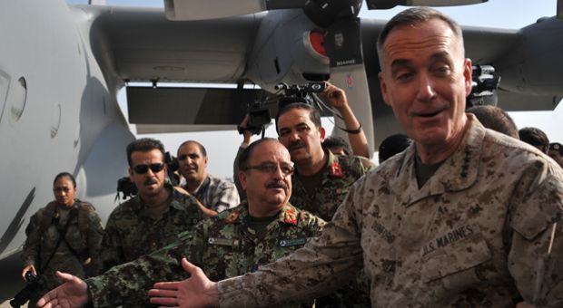 Commander of the International Security Assistance Force (ISAF) in Afghanistan, Joseph Dunford, speaks during the handing over ceremony of two C-130 transport aircraft at Kabul international airport as the US and NATO coalition starts to withdraw.  