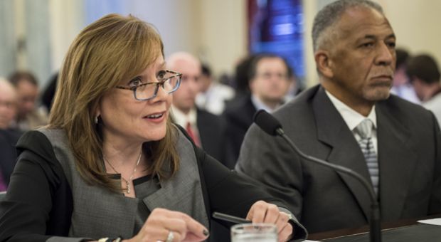 Rodney O'Neal (R), Chief Executive Officer and president of Delphi Automotive PLC, listens while Mary Barra, Chief Executive Officer of the General Motors Company, speaks during a hearing of the Senate Commerce, Science and Transportation Committee's Consumer Protection, Product Safety, and Insurance Subcommittee hearing on Capitol Hill July 17, 2014 in Washington, DC.  