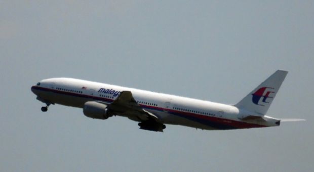 This photo shows Malaysia Airlines flight MH17 leaving Schiphol Airport in Schiphol, the Netherlands, on July 17, 2014. Malaysia Airlines said on July 17 that it had 'lost contact' with one of its passenger planes whose last known position was over eastern Ukraine, amid speculation it had been shot down.  