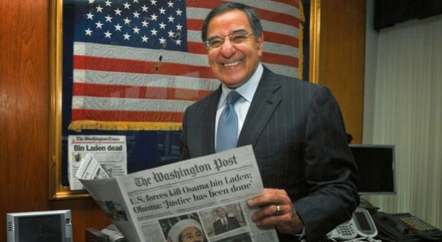 Leon Panetta holds a copy of The Washington Post reporting Osama bin Laden's death. 

