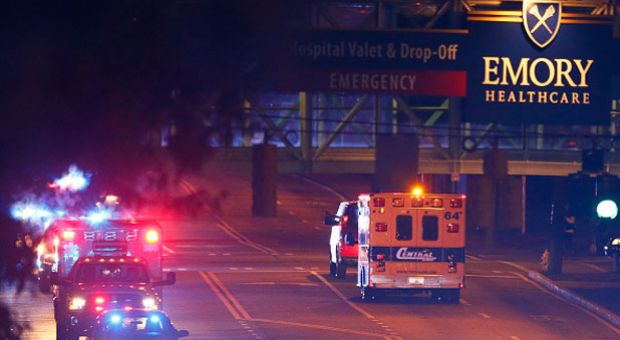 Ebola patient Amber Vinson arrives by ambulance at Emory University Hospital on October 15, 2014 in Atlanta, Georgia. Nurse Amber Vinson joins Nina Pham as health workers who have contracted the Ebola virus at Texas Heath Presbyterian Hospital while treating patient Thomas Eric Duncan, who has since died. 