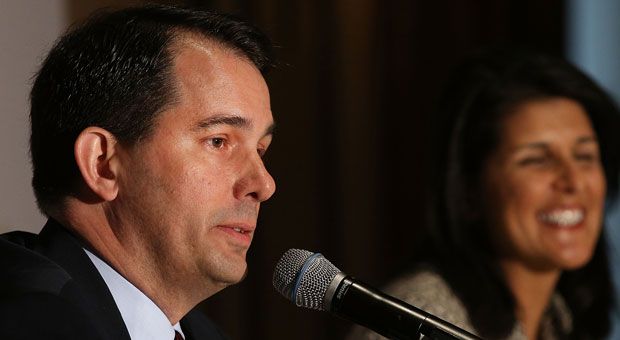 Wisconsin Gov. Scott Walker attends a news briefing during the Republican Governors Association's quarterly meeting on May 21, 2014 in New York City. Appearing with Walker was South Carolina Gov. Nikki R. Haley. 