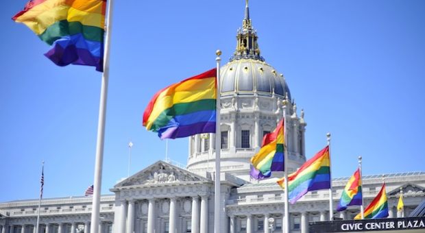 Rainbow flags line the courtyard at San Francisco's City Hall building on June 26, 2012.  