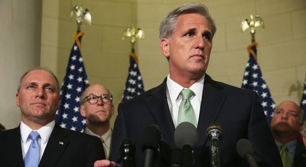 At right, House Majority Whip Rep. Kevin McCarthy (R-CA) speaks as Rep. Steve Scalise (R-LA) (left) listens after a leadership election at a House Republican Conference meeting June 19, 2014 on Capitol Hill in Washington, DC. House GOPs have picked McCarthy as the new House majority leader and Scalise as the new majority whip.  