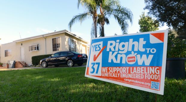 A sign supporting Proposition 37 which calls for the mandatory labeling of genetically engineered foods is seen in front of a home in Glendale, California October, 19, 2012. 