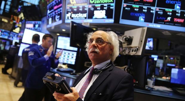 Traders work on the floor of the New York Stock Exchange (NYSE) on September 25, 2014 in New York City. 