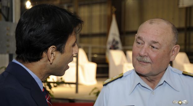 U.S. Coast Guard Commandant Adm. Thad Allen talks with Louisiana Gov. Bobby Jindal before a keel laying ceremony for the first Coast Guard Sentinel Class Fast Response Cutter at the Bollinger Shipyards, April 9, 2010 - just a week and a half before the Deepwater Horizon oil rig explosion.