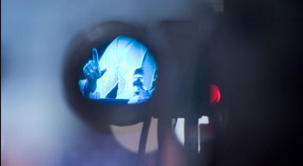 President Barack Obama is seen through the eyepiece of a video camera as he delivers remarks on health care reform at Arcadia University in Glenside, Pa., March 8, 2010.