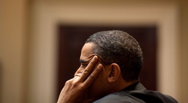 President Barack Obama listens during a meeting in the Roosevelt Room of the White House, March 11, 2010. 