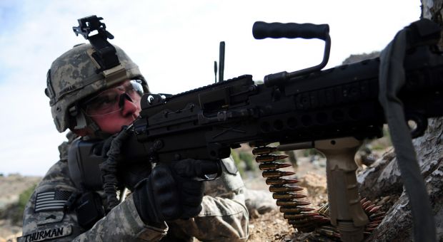 U.S. Army Sgt. Joshua Thurman of Alpha Troop, 1st Squadron, 33rd Cavalry Regiment, 3rd Brigade, 101st Airborne Divison, provides security while on patrol in Spera, Khowst province, Afghanistan, March 11