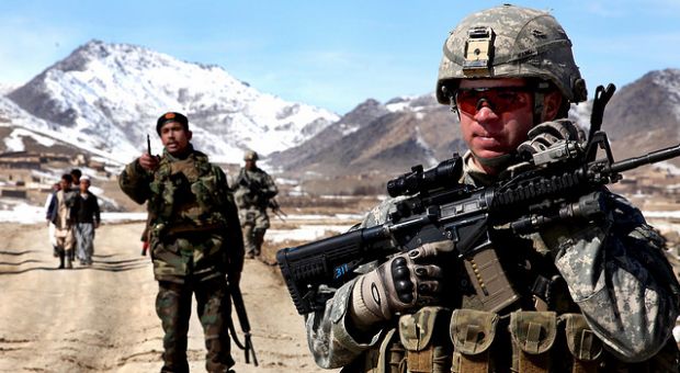 A U.S. Army Soldier patrols with Afghan soldiers to check on conditions in the village of Yawez in Wardak province, Afghanistan, Feb. 17, 2010