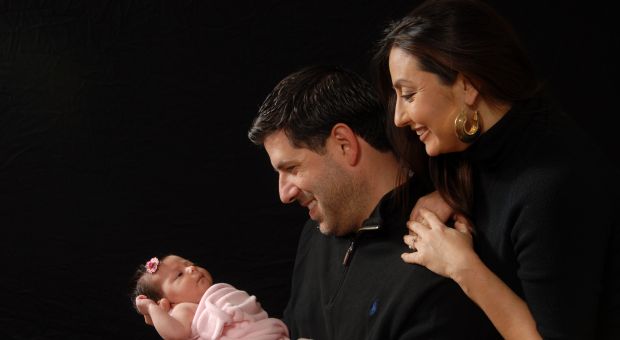 Father Albert Cutie with his wife and baby