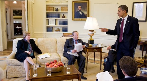 President Barack Obama gestures during a meeting with his economic team, including from left, Counsel of Economic Advisors Chair Christy Romer, National Economic Council Director Larry Summers, and Treasury Secretary Timothy Geithner, in the Oval Office, March 5, 2010