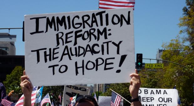 Signs at a May 2010 immigration reform rally in Los Angeles, CA