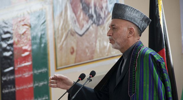 Afghan President Hamid Karzai gives a speech at the National Military Academy of Afghanistan, during the graduation ceremony for 212 new officers March 18, 2010