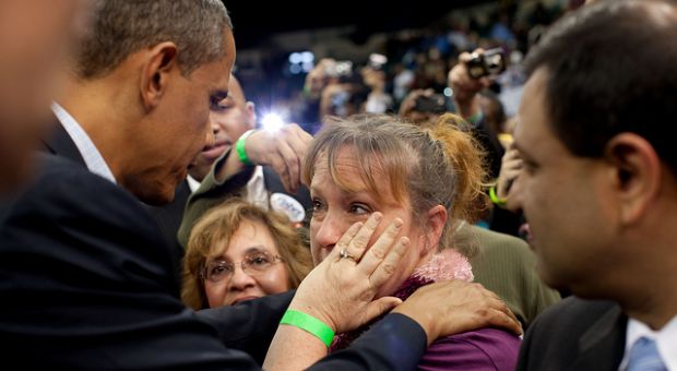 President Barack Obama greets a woman in the audience after speaking at Cleveland State University in Cleveland, Ohio, Oct. 31, 2010