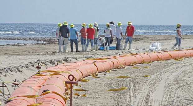 Oil containment boom on the beach at Grand Isle, Louisiana on June 10, 2010